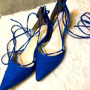 Nine West Strappy pumps.
